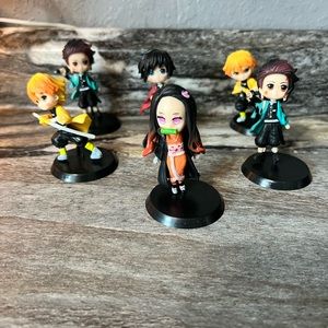 6 anime figures with removable stands…. New without tags
